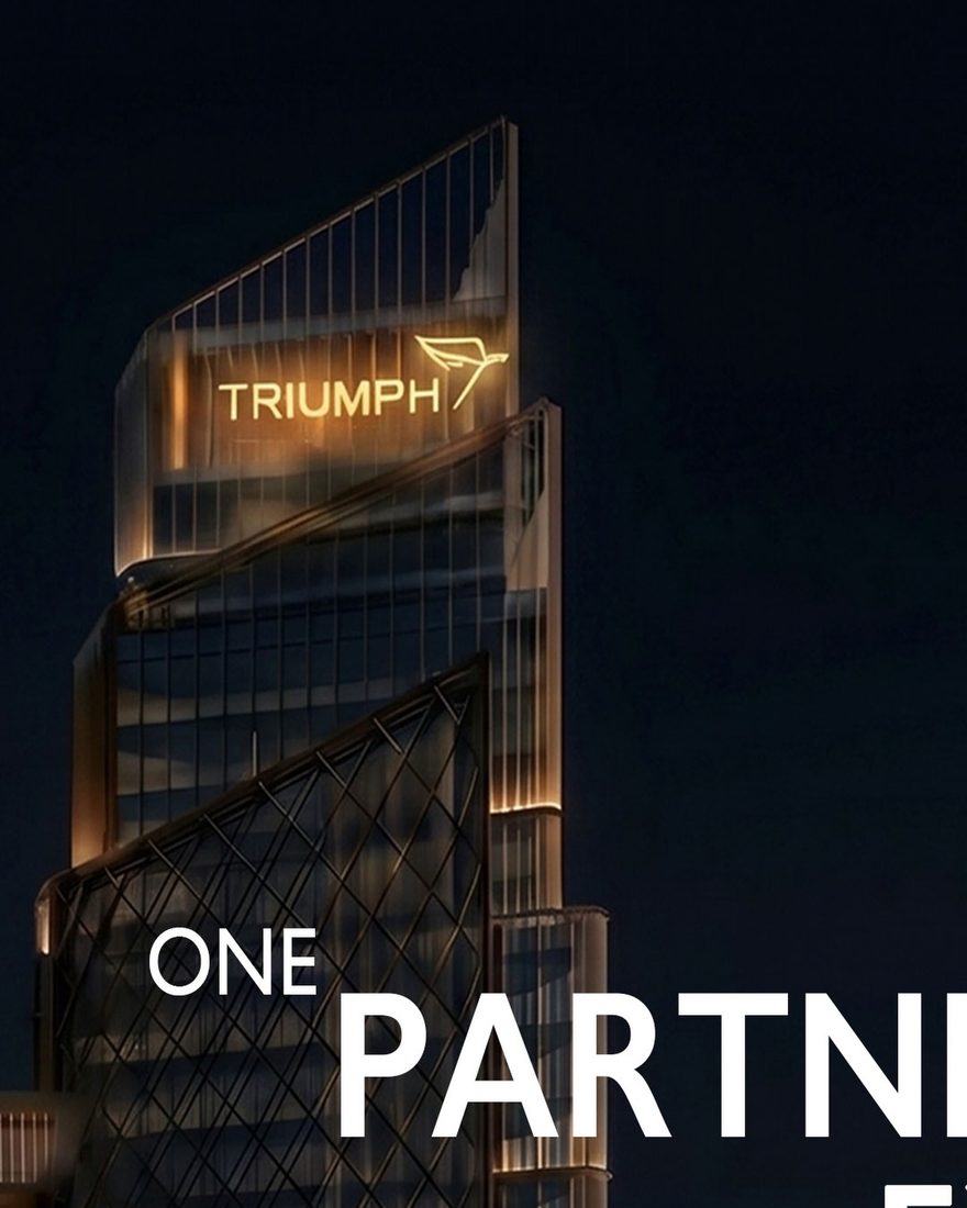 Triumph Pyramids Hotel tower at night